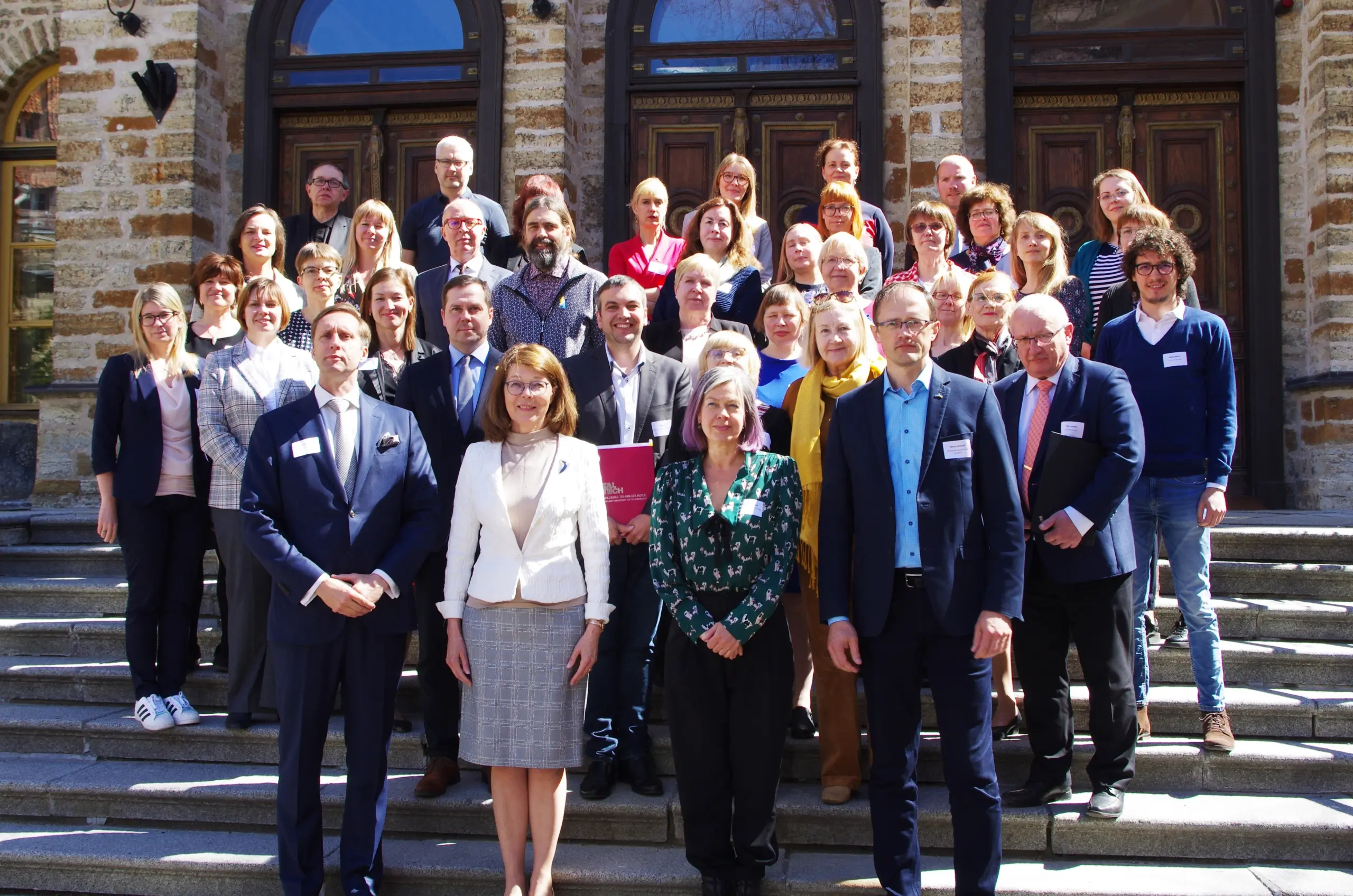 Group photo of 40 people outside the Estonian Academy of Sciences in Tallinn