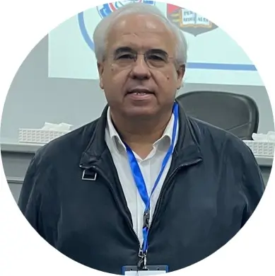 Portrait photo of a man in a white shirt