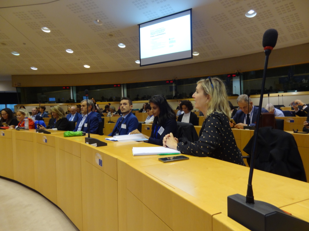 participants in a large auditorium in the European Parliament 