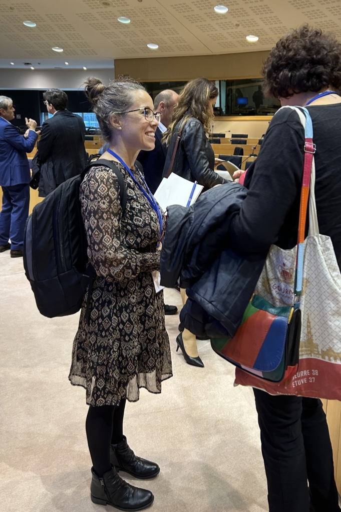 young woman talking to a conference participant